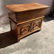 Old wooden baker's chest with storage drawers