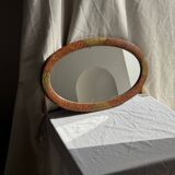 Small oval Art Deco mirror in brown and gold 33x54.