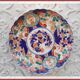Ancient round porcelain dish from Japan Imari
