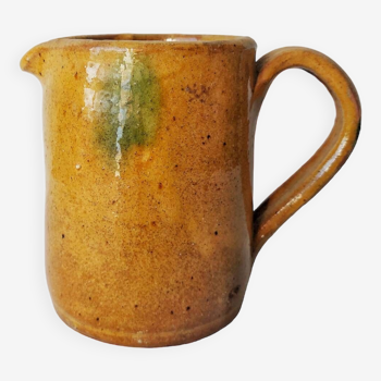 Old glazed terracotta pitcher