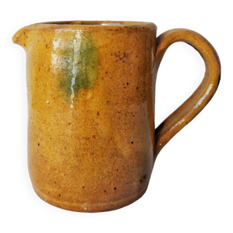 Old glazed terracotta pitcher