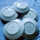 Five numbered opaque porcelain plates from Badonviller.