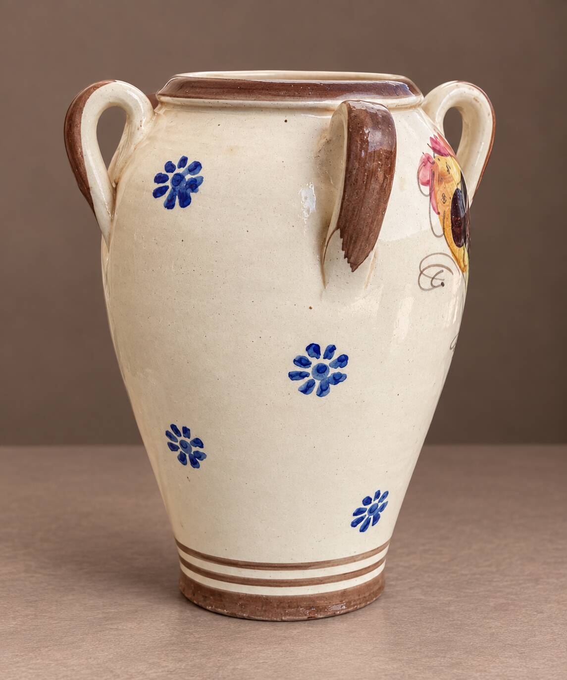 Ceramic vase with four handles from Grottaglie, decorated with a rooster, Apulia.