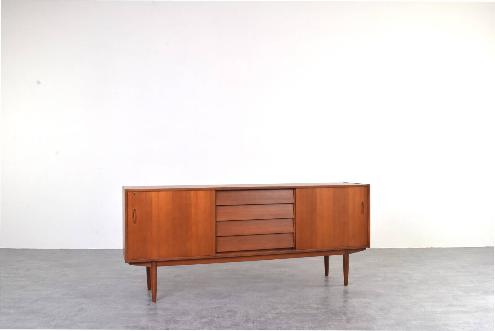 Mid-Century Teak Scandinavian Sideboard by Nils Jonsson for P.S. Heggen