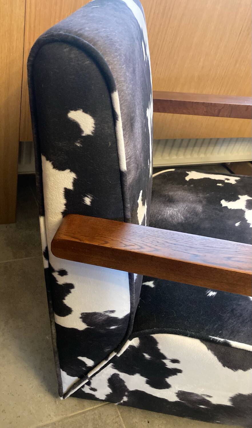 Armchair in walnut and animal print velvet