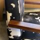 Armchair in walnut and animal print velvet