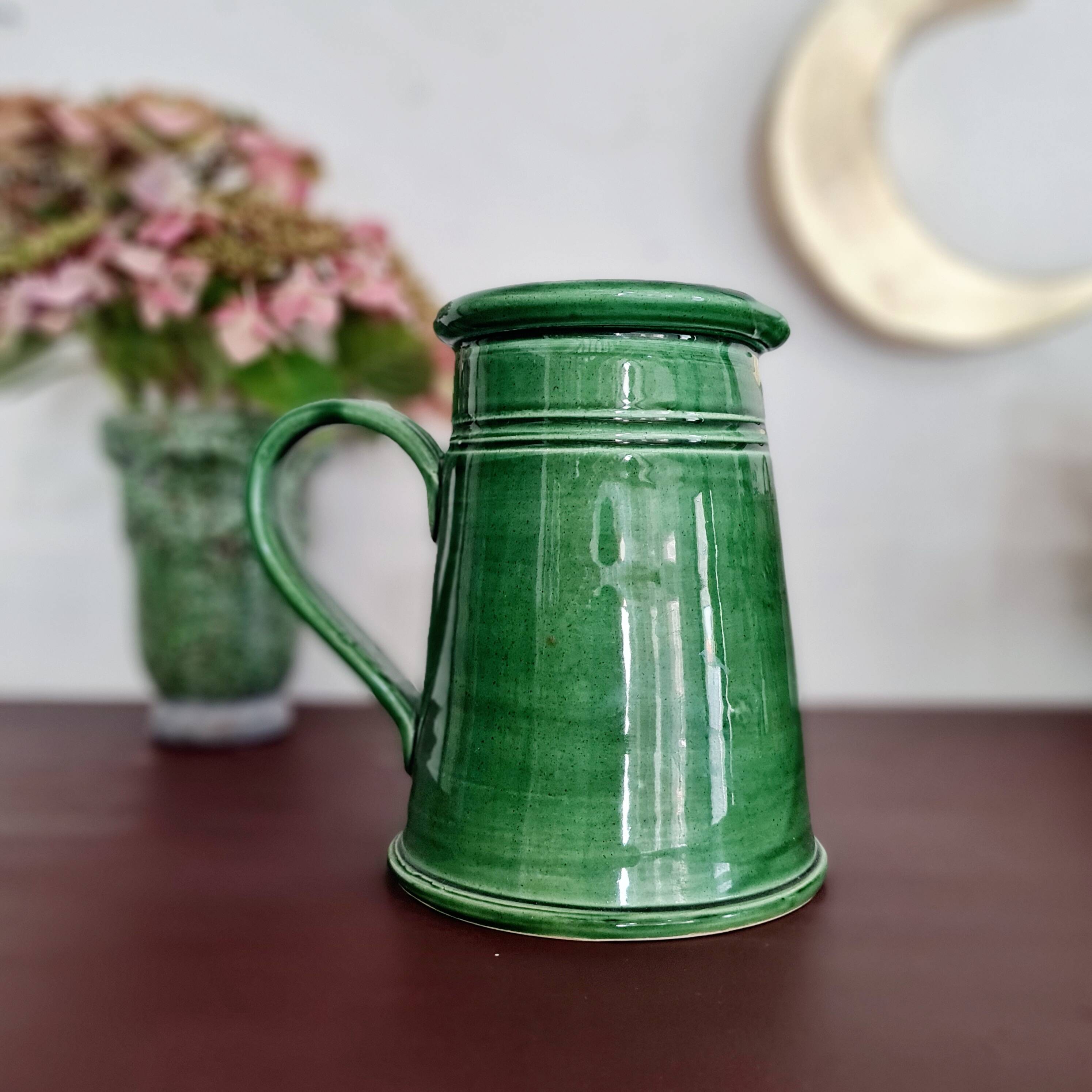 Green glazed terracotta pitcher