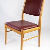 Suite of six chairs in oak and leather