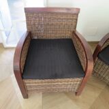 2 colonial-style armchairs in woven rattan and exotic wood