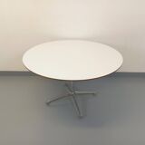 Vintage Eames round table for Vitra in white melamine, wood, and metal.