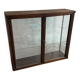 Dark-stained wood and glass vintage display cabinet — early 20th-century wall-mounted showcase