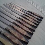 12 ART DECO KNIVES.  bi-color handle