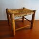 Vintage straw wood low stool