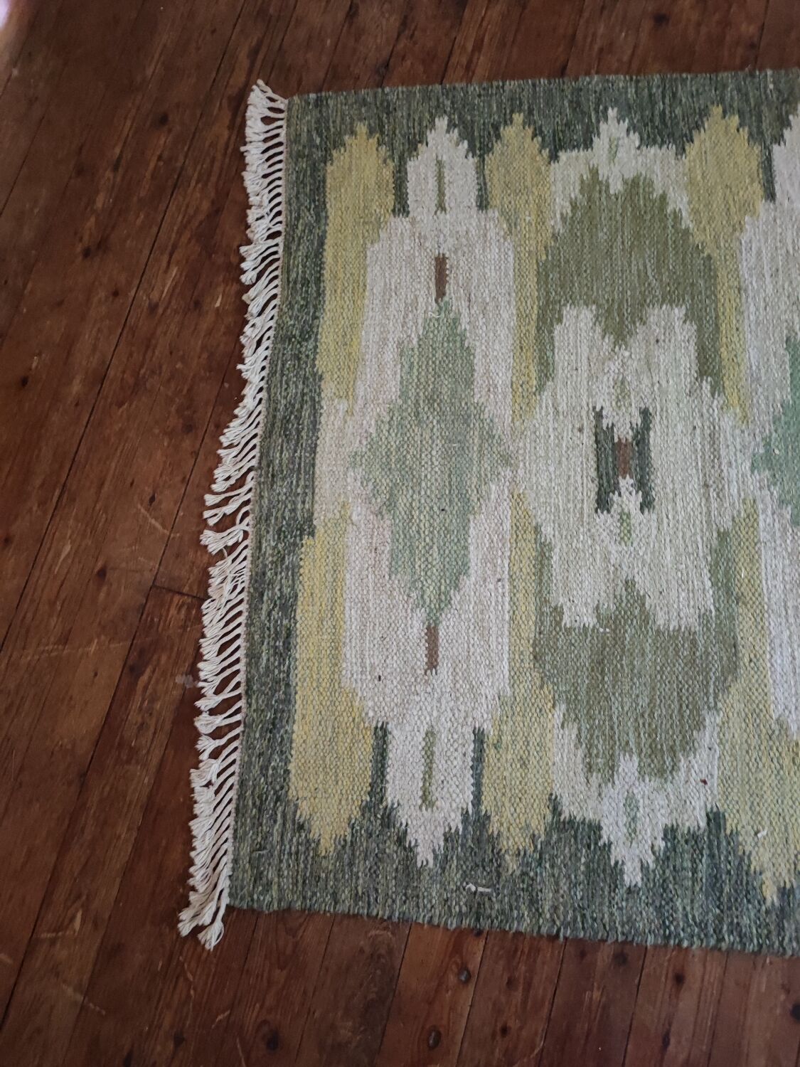Green Scandinavian kilim carpet
