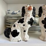 Pair of black Cavalier King Charles dogs in Staffordshire pottery, 19th century.