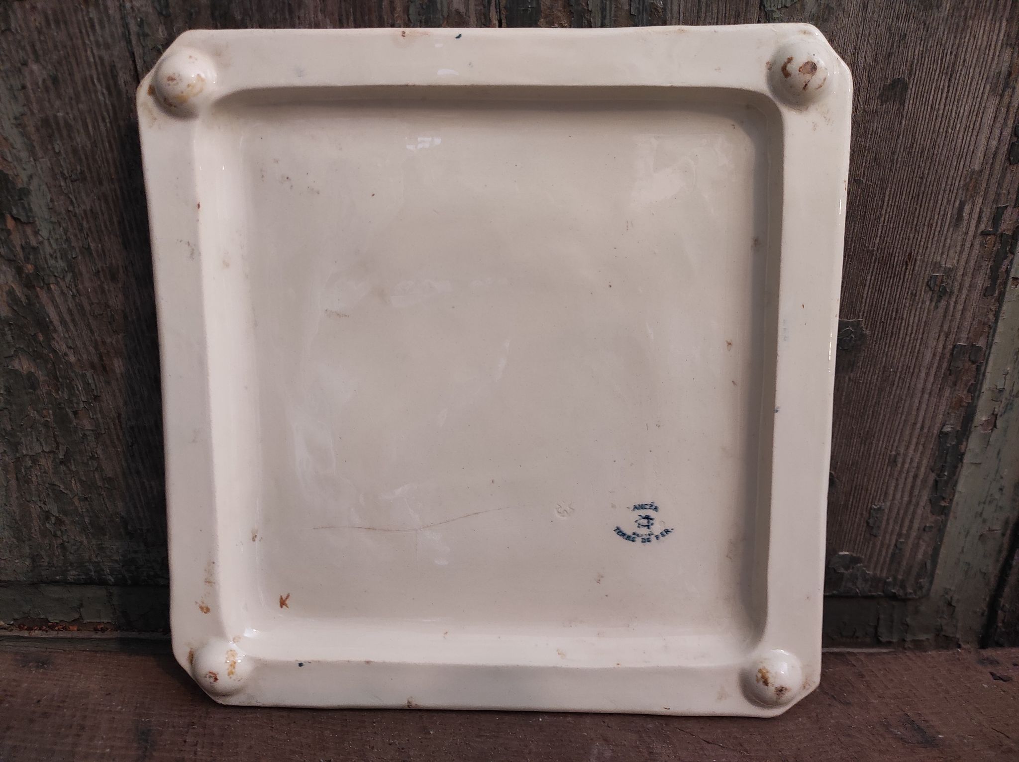 Trivet antique en porcelaine Français