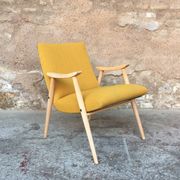 Fauteuil vintage pieds compas et accoudoirs en bois massif, since 1950