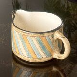 Antique milk jug.