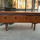 Curved teak enfilade from the 1960s in London.