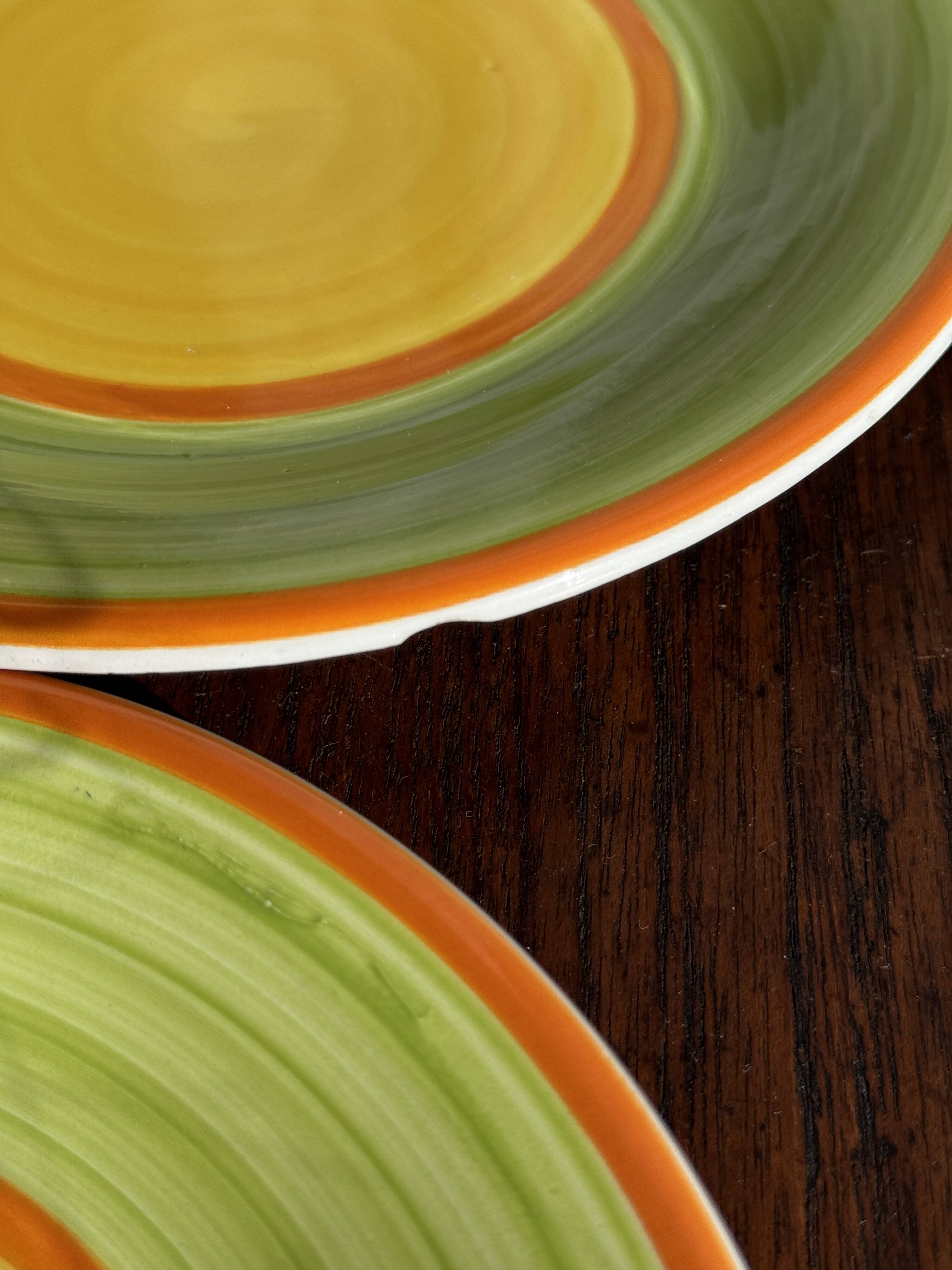 Set of 4 Italian ceramic plates in green, orange, and yellow splashes D20.