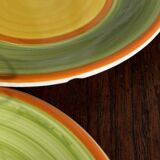 Set of 4 Italian ceramic plates in green, orange, and yellow splashes D20.
