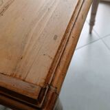 Antique wooden desk with a patinated base