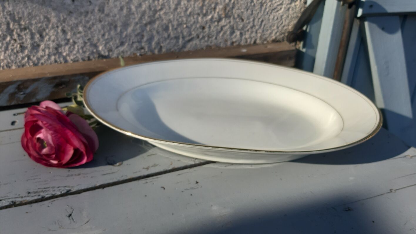 former oval white and gold Limoges porcelain dish