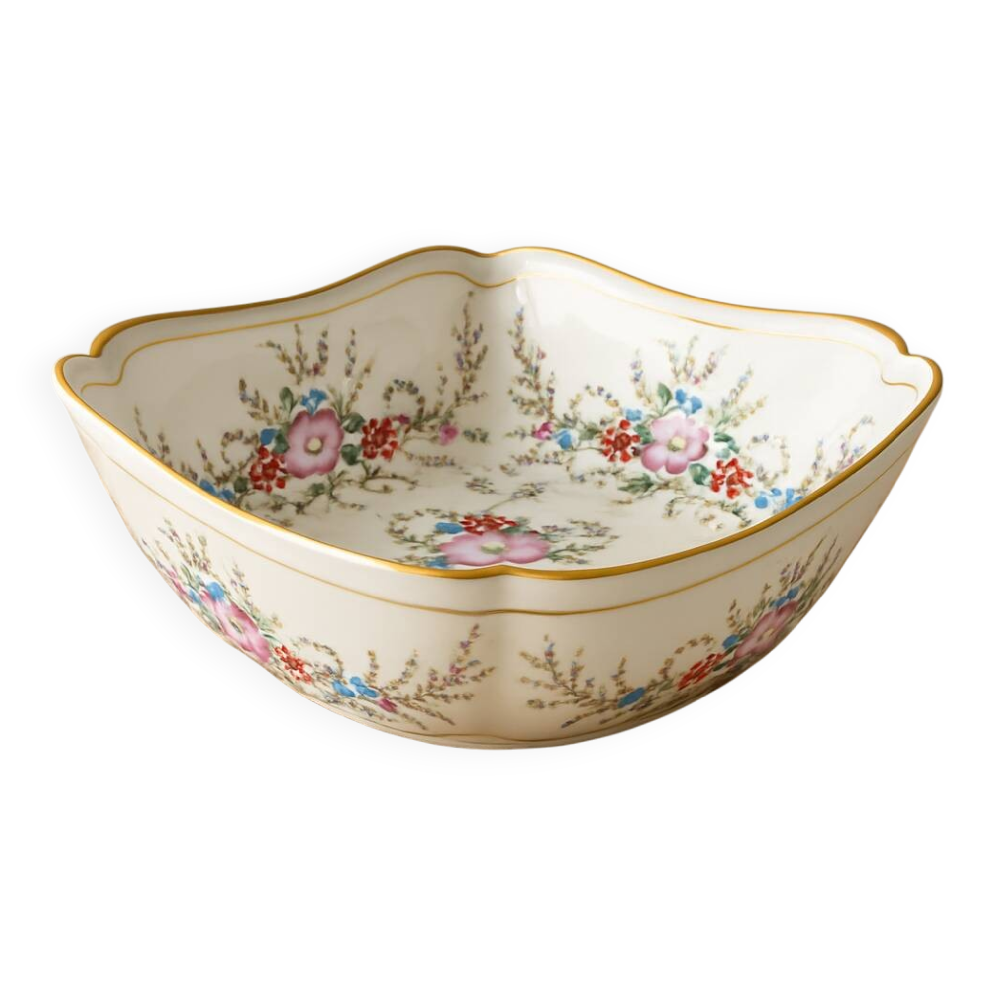 Old hollow porcelain dish with floral decoration and gold trim
