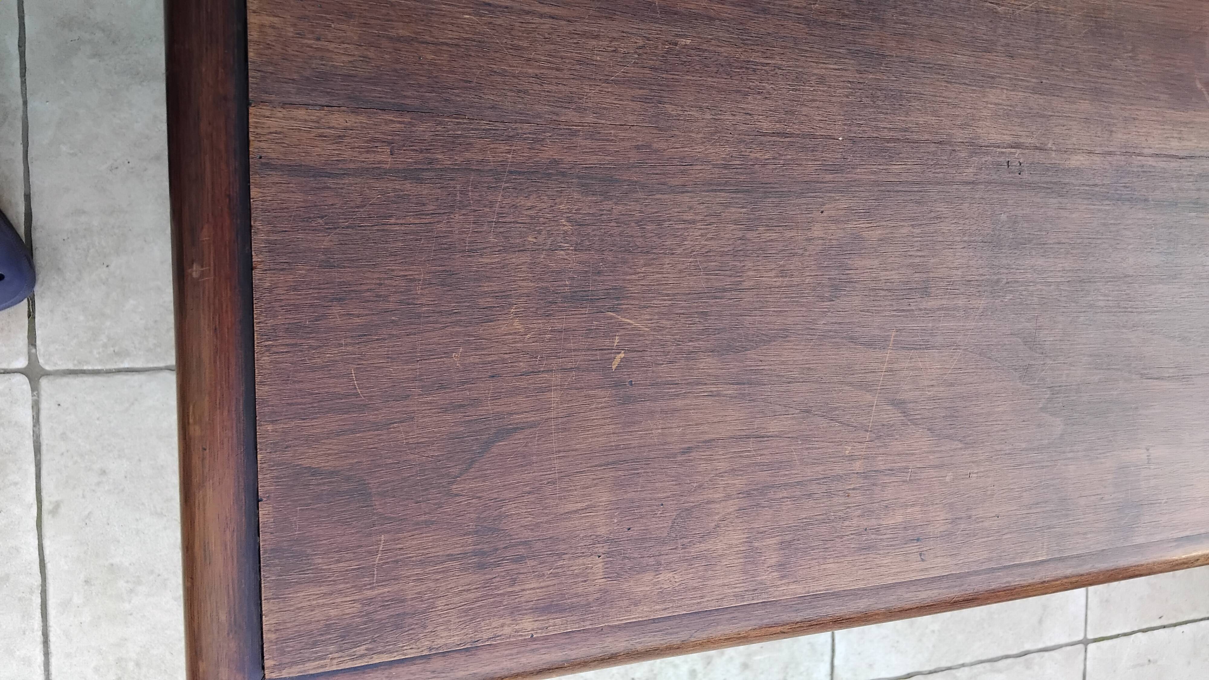 Antique desk or small table in solid carved wood