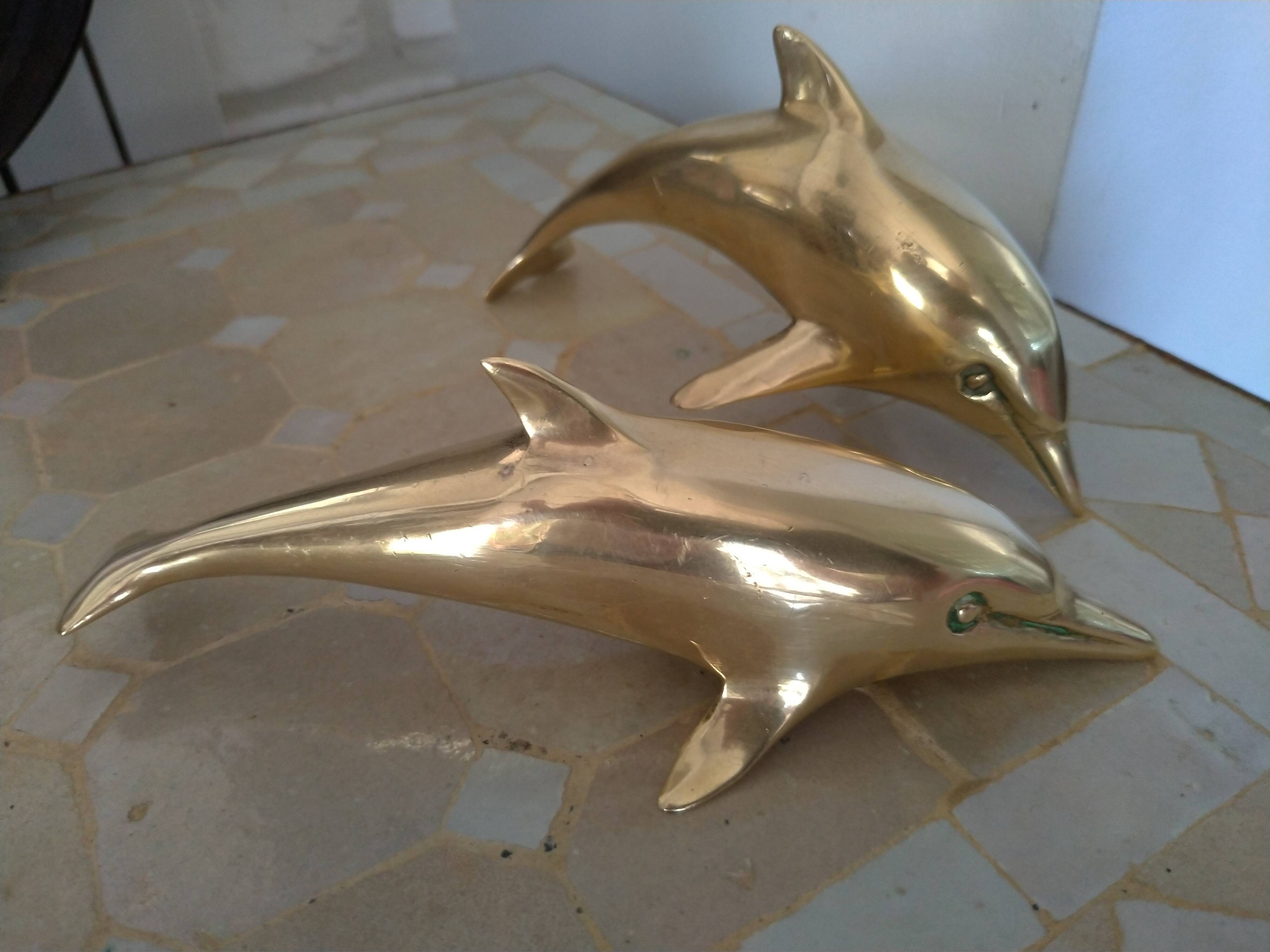 Brass dolphins