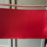 2 tubular chairs in red leather 1970