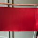 2 tubular chairs in red leather 1970
