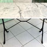 Marble and cast iron bistro table