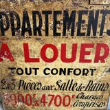 Old plaque “Apartments for rent”