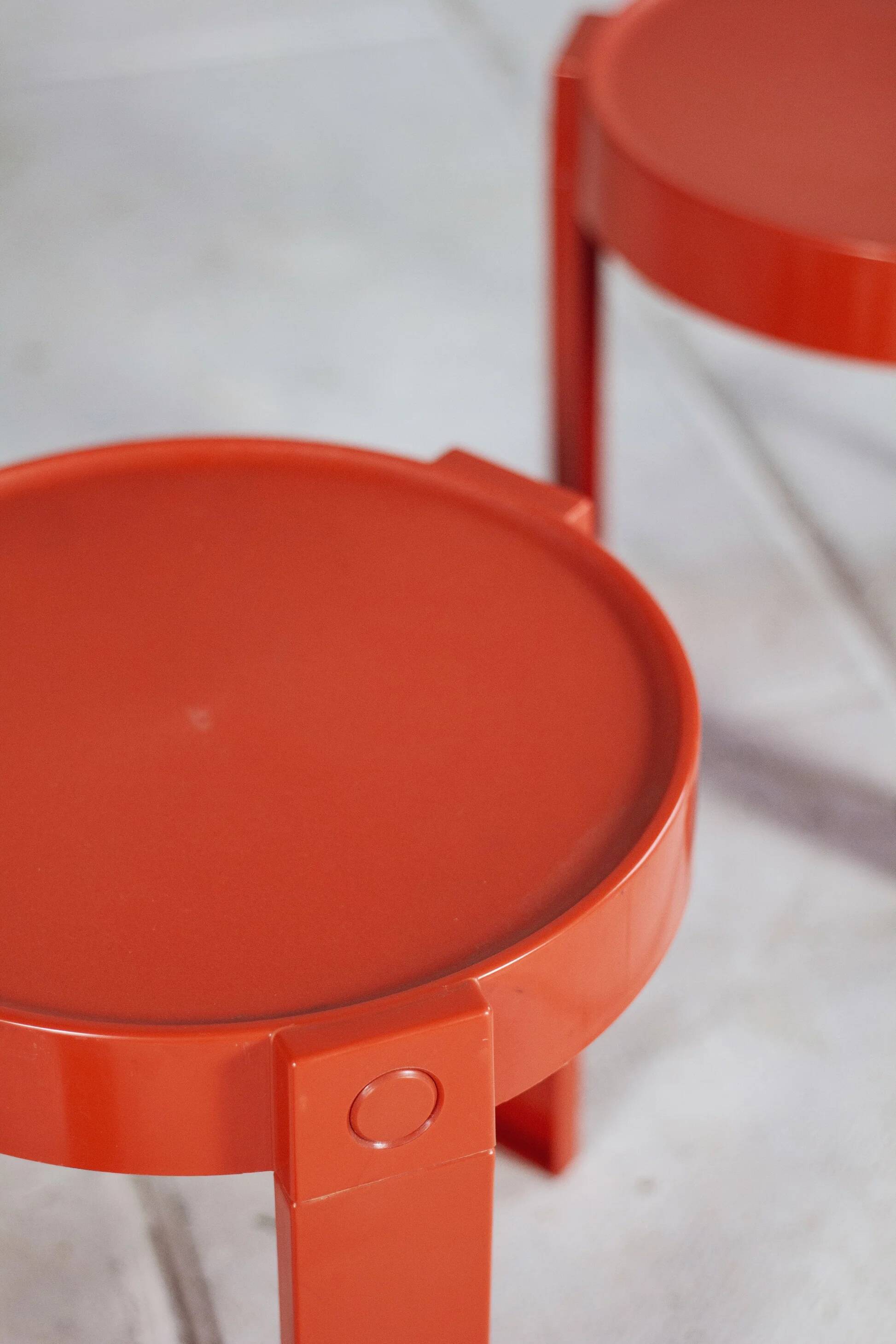 3 nesting tables in orange plastic by Prisunic, 1970.