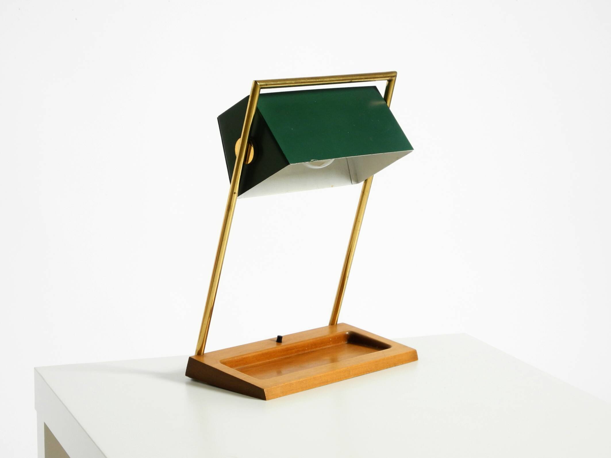 1960s Temde table lamp with a brass frame, teak base, and green lampshade