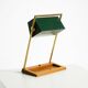 1960s Temde table lamp with a brass frame, teak base, and green lampshade