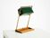 1960s Temde table lamp with a brass frame, teak base, and green lampshade