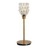 Table lamp with an antique tulip lampshade in glass and a golden foot