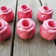 Set of candle holders shaped rosebud
