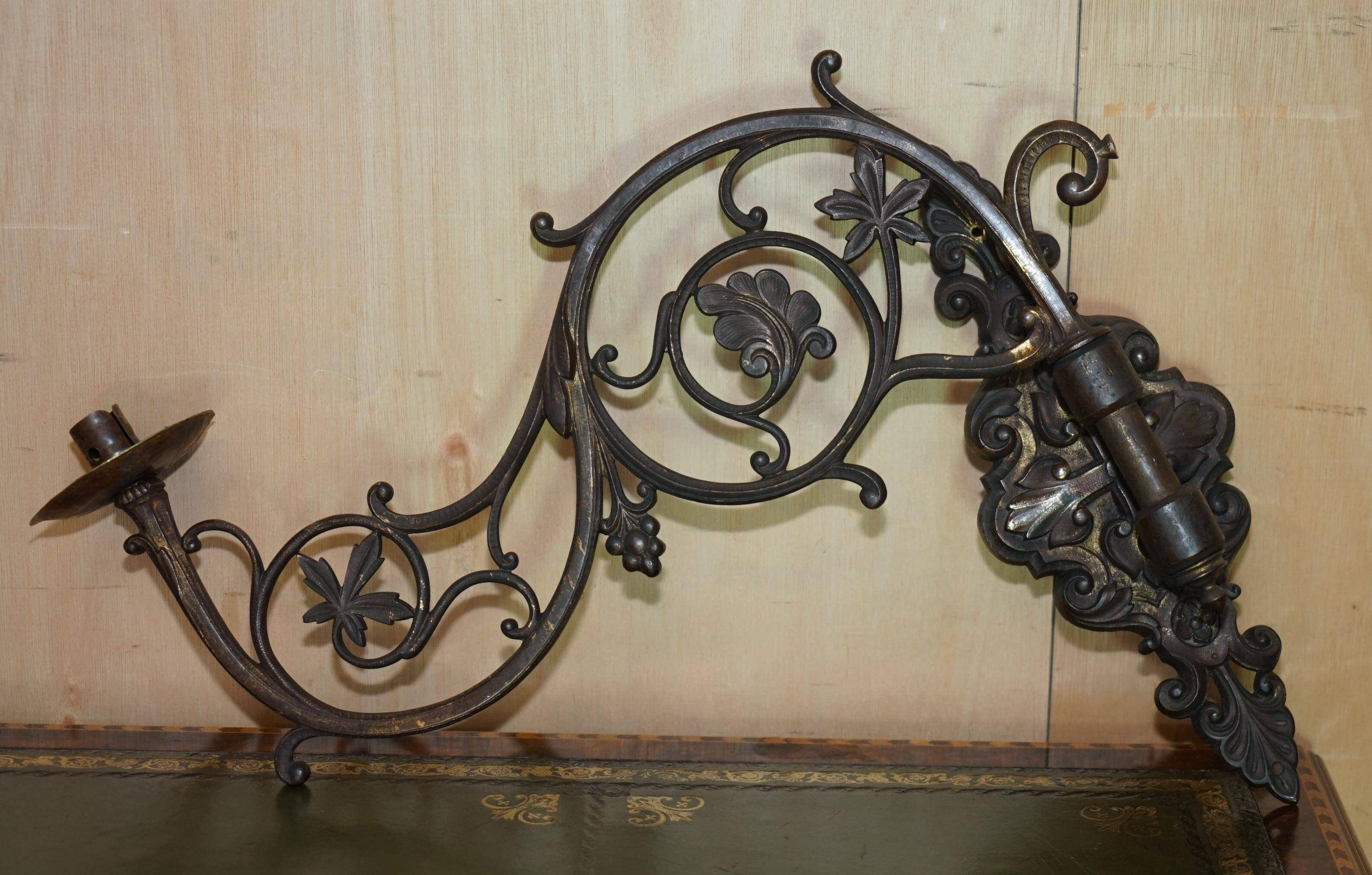 Pair of antique wall sconces in gilded bronze.
