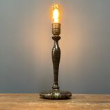 Black table lamp with paint splatters from the 1920s