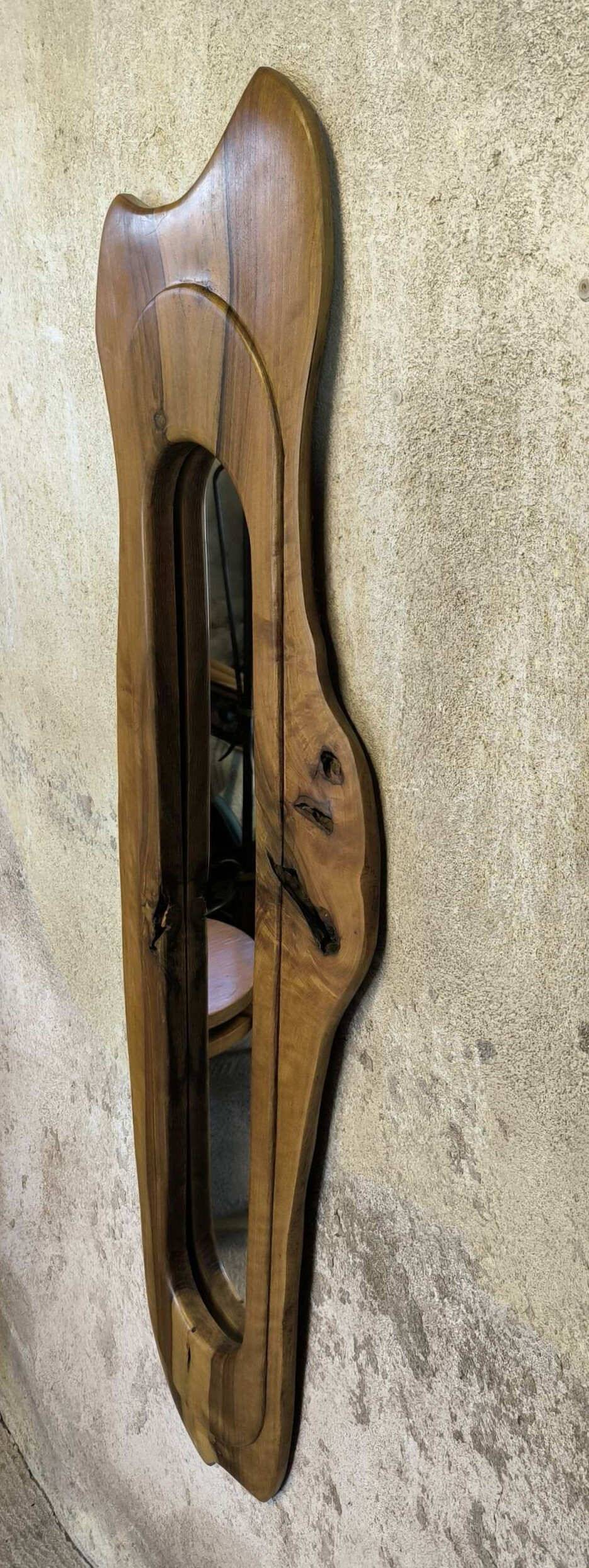 Vintage free-form mirror in solid wood.