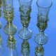 pair of green glass champagne flutes - label