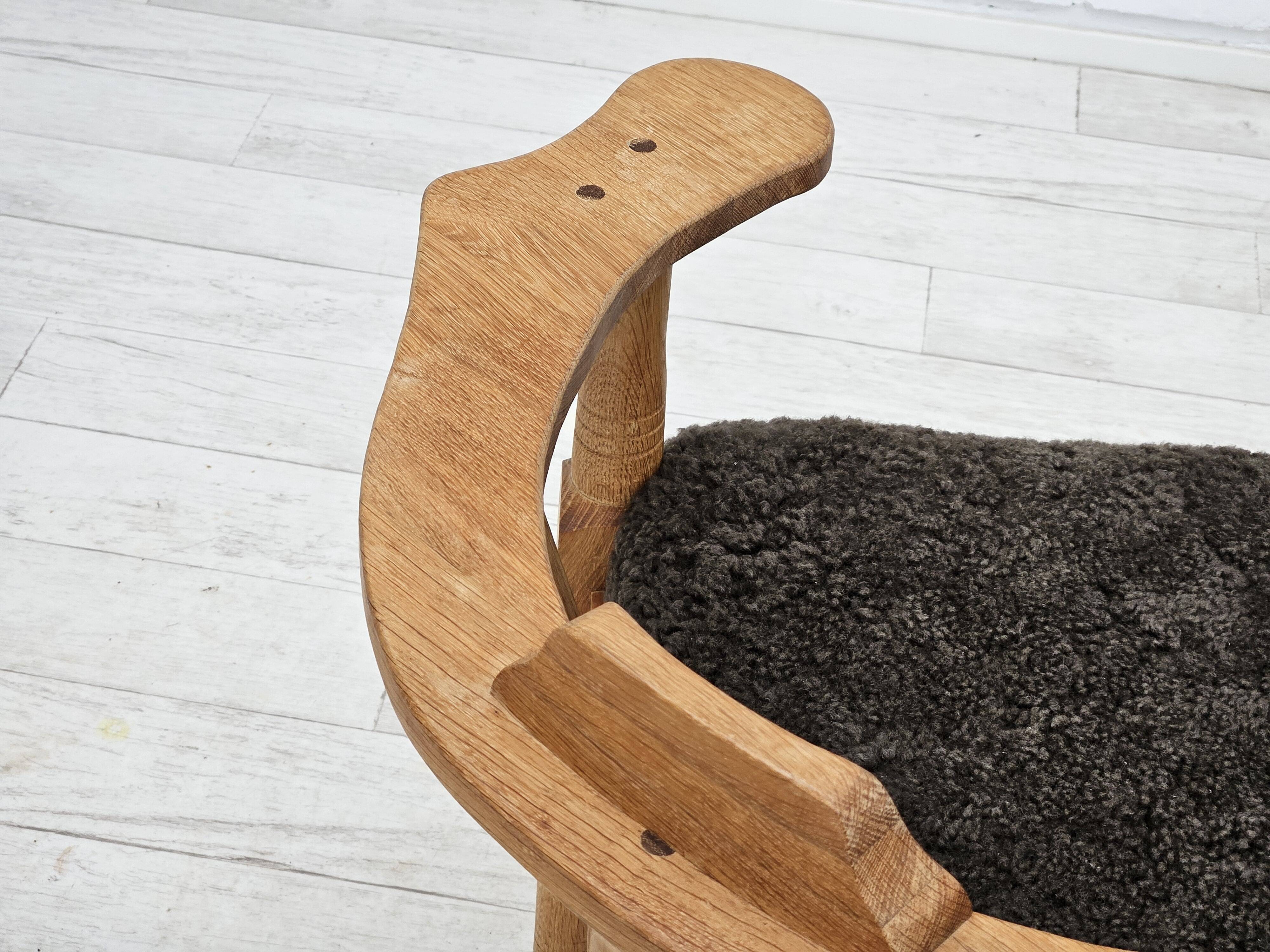 1950s, Danish design, reupholstered armchair, New Zealand sheepskin, oak wood.