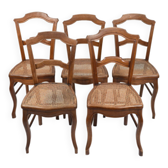 Ensemble de 5 chaises anciennes en cannage.