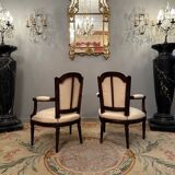 Pair of walnut armchairs from the Louis XVI period around 1770