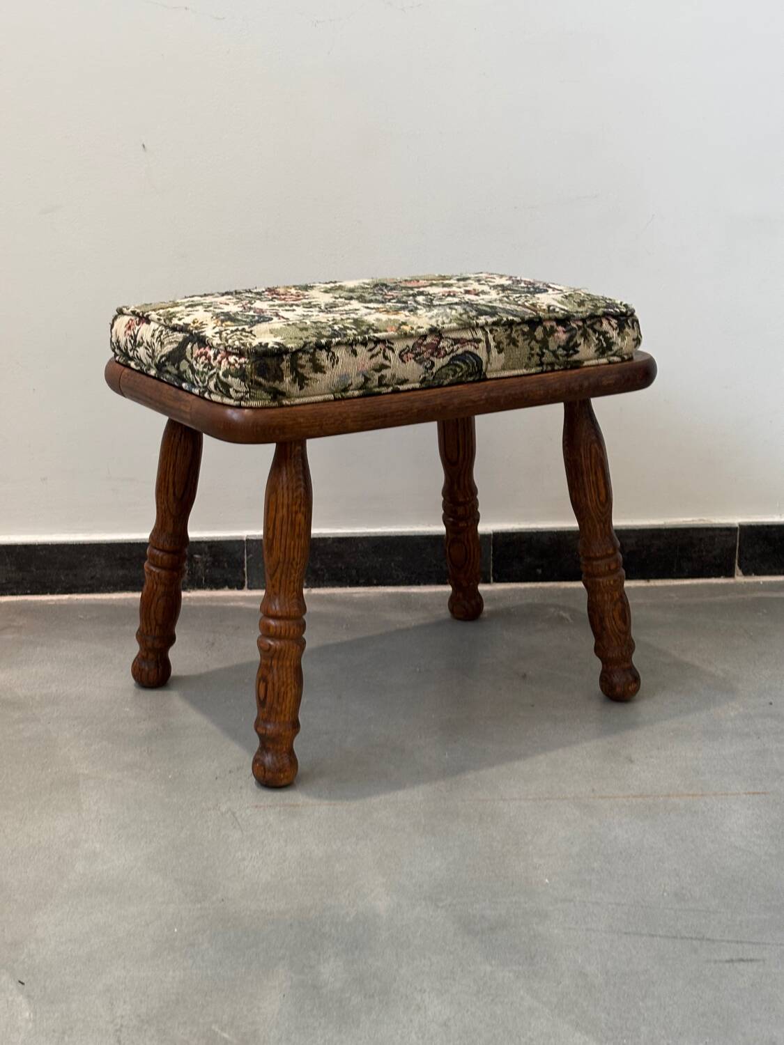 Wooden stool with cushion