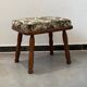 Wooden stool with cushion