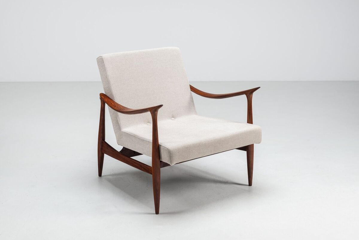 Sculptural Danish lounge chair in teak and fabric Denmark 1960